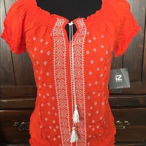 Orange Women’s blouse with embroidery